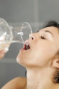 Pretty raven haired Adele drinks her own piss